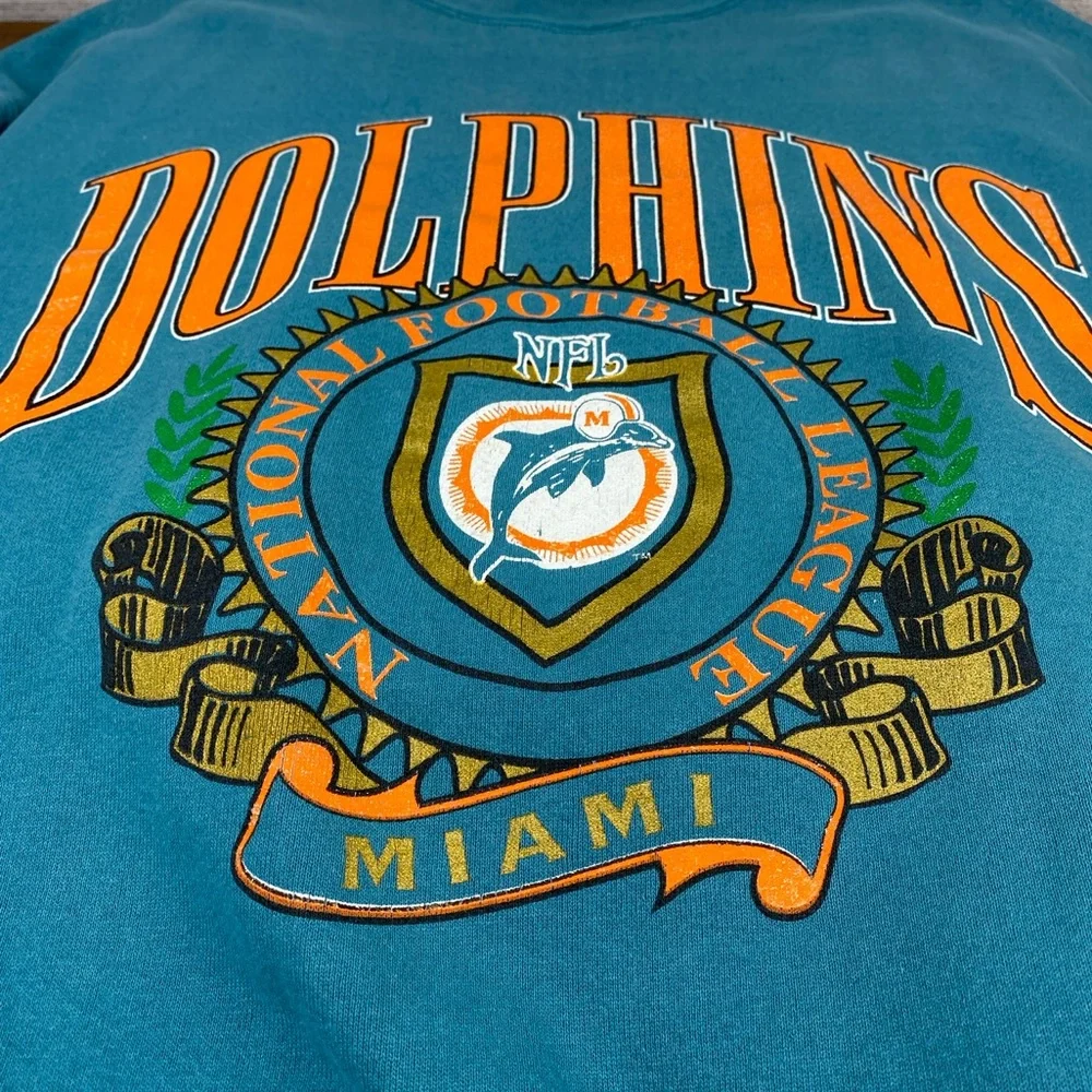 Vintage 1990s Miami Dolphins Nutmeg NFL Turquoise Orange Crewneck Sweater Mens L